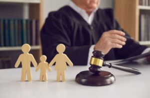 An Ohio judge sitting at his desk with a gavel explaining court ordered parenting classes in Ohio.